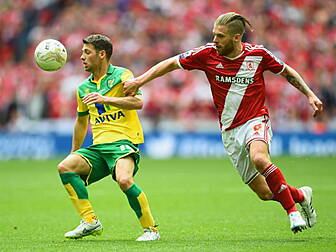 Canaries soar back to Premier...